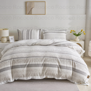 Epic Set Linen Stripe luxury quilt set design and matching pillow covers styled in a modern bedroom interior.
