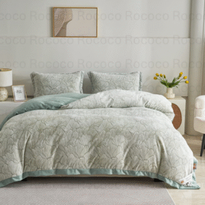 Epic Set Mint Blossom luxury quilt set design and matching pillow covers styled in a modern bedroom interior.