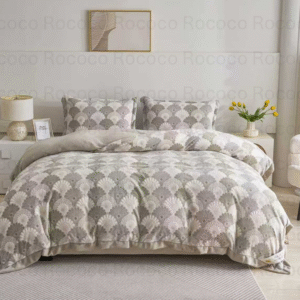 Epic Set Shell Bloom luxury quilt set design and matching pillow covers styled in a modern bedroom interior.