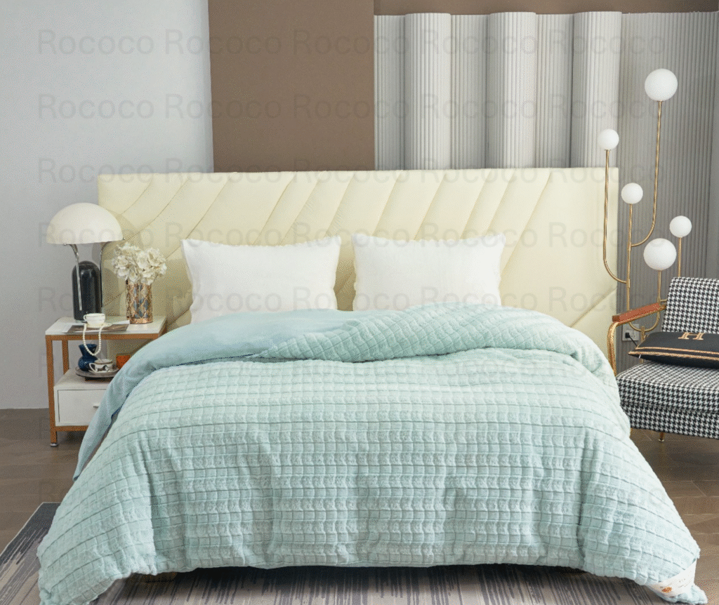 Feather Fold Aqua Blocks soft aqua textured double quilt on modern luxury bed setup