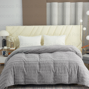 Feather Fold Silver Grid soft grey textured double quilt on modern luxury bed setup