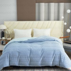 Feather Fold Sky Lines soft blue textured double quilt on modern luxury bed setup