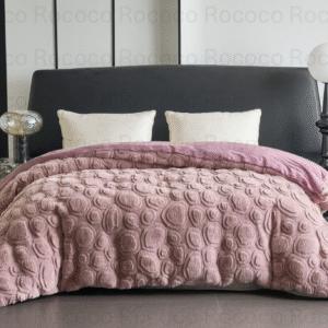 Luxury blush pink quilt set with embossed texture for modern bedroom