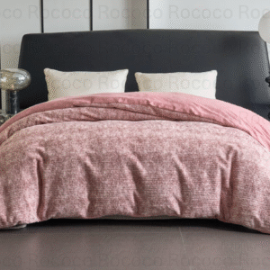 Snuggle Haven Blush Whisper pink textured luxury quilt on modern double bed